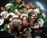 A picture of step 2 of Garlic Mushroom, Kale & Broccoli w/Purple Sweet Potato noodles.