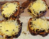 A picture of step 9 of Curried potato filled peppers with cheese.