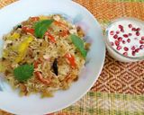A picture of step 8 of Shahi Veg Biryani in microwave.