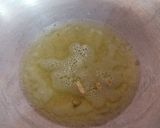A picture of step 2 of Zarda Chawal 🧡❤️💛.