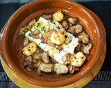 Foto del paso 6 de la receta: Bacalao con champiñón y langostinos al ajillo