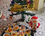 A picture of step 7 of Christmas special vanilla tutti fruti cup cakes.