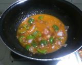A picture of step 10 of Honey chilli banana.