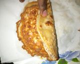 A picture of step 2 of Wrap n roll(chapati and omelette).