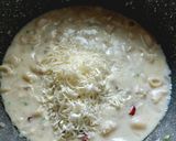 A picture of step 4 of CHEESY GARLIC PASTA in WHITE SAUCE.