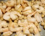 A picture of step 2 of Warm chickpea and prawn salad.