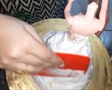 A picture of step 8 of Eggless Doll cake pineappple flavour.