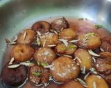 A picture of step 7 of Badhusha (sweet).