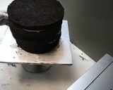 A picture of step 4 of 8 inch tall chocolate brownie cake.