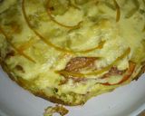 Foto del paso 7 de la receta: Tortilla de patata con calabacín y rodajas de tomate natural