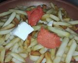 Foto del paso 2 de la receta: Patatas y huevos con queso y sobrasada