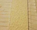 Foto del paso 2 de la receta: Trenza de hojaldre rellena de turrón de chocolate blanco