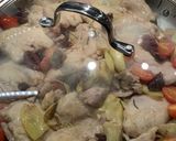 A picture of step 6 of Chicken with Artichokes, Tomatoes, Garlic, and Olives.