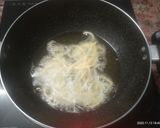A picture of step 3 of Rice Murruku.