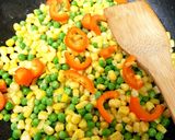 A picture of step 2 of My Buttered Sweetcorn and peas sidedish. 😘.