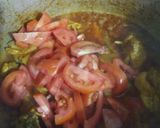 A picture of step 5 of Palak chicken with boiled rice.