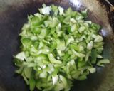 A picture of step 2 of Besan simla mirch ki sabji.