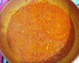 Foto del paso 3 de la receta: Huevos en salsa de tomates y toque de especias
