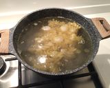 Foto del passaggio 6 della ricetta Fusilloni con ragù d'anatra alla birra, crema di porcini, funghi pioppini e pinoli tostati