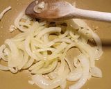 A picture of step 1 of Bangers, mash n onion gravy.