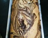 A picture of step 11 of Tahini Chocolate Cake with Coconut Chocolate Mousse frosting.