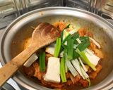 A picture of step 4 of Jae Yook Bokk GeumStir Fry Kimchi and Pork Belly.