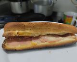 Foto del paso 6 de la receta: Sandwich🥖de jamón🥓🍯, queso🧀y salsa de piña🥐🥯🍍