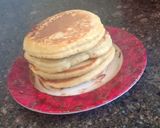 A picture of step 5 of Fluffy pancakes with chocolate syrup.