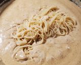 A picture of step 15 of Chicken Fettuccine Alfredo.