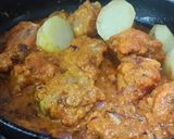 A picture of step 2 of Paanch Phoron Chicken.