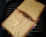 A picture of step 6 of Cheesy Egg Toast Grilled Sandwich.