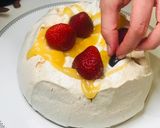 A picture of step 3 of Pavlova with berries and lemon curd.