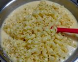 A picture of step 5 of White Sauce Cheesy Pasta.