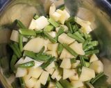 A picture of step 1 of Gavar potato nutty sabji.