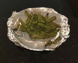 A picture of step 3 of Butter Roasted Jalapeño Peppers.