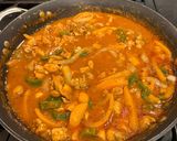 A picture of step 5 of Chicken Mango Curry.