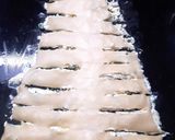 A picture of step 6 of Cream Cheese Christmas Tree Bread Sticks.