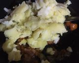 A picture of step 4 of Aloo ka bartha.