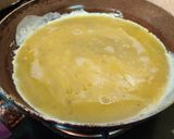 A picture of step 2 of Open Egg Cheese Sandwich.