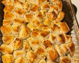 A picture of step 2 of “bubble up pizza”.