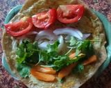 A picture of step 5 of Egg wrap with veggies.