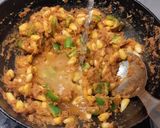A picture of step 10 of Corn paneer capsicum curry.