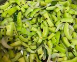 A picture of step 2 of Snake gourd sabji fry.