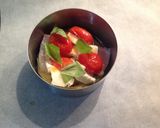 Foto del passaggio 4 della ricetta Parmigiana di spigola con terra di olive taggiasche e pinoli