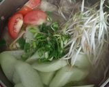 Hình bước làm 4 của món Canh măng chua đầu cá lăng