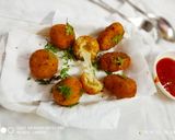 A picture of step 4 of Cheesy Arancini(eggless).