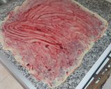 A picture of step 7 of Ensaimada with Mixed Berry Coulis.