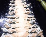 A picture of step 6 of Cream Cheese Christmas Tree Bread Sticks.