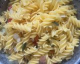 A picture of step 5 of Fusilli Pasta with White Creamy Sauce😋(Maize-Rice).