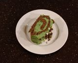 A picture of step 28 of Chocolate Cake Roll with Pistachio Cream Filling and Frosting.